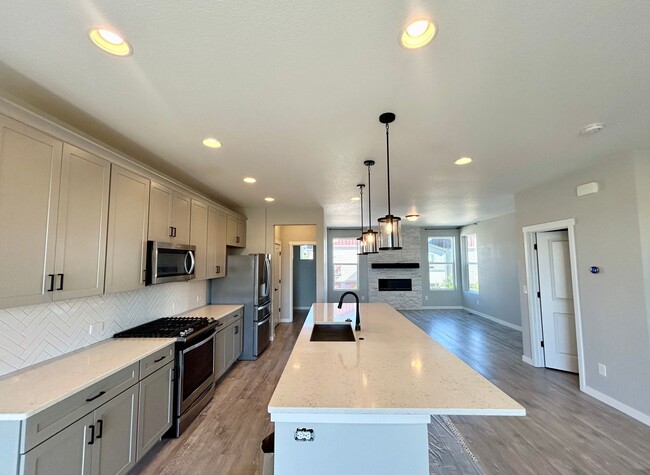 Building Photo - Impressive 4 Bedroom Townhome Nestled in M...