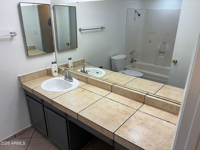 Building Photo - 8819 W Roma Ave