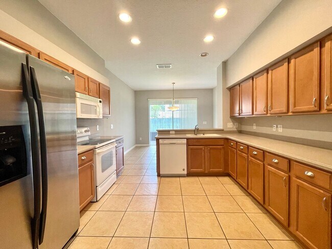 Building Photo - SOUTHEAST ORLANDO  - NICE UPGRADED HOUSE IN TIVOLI WOODS VILLAGE