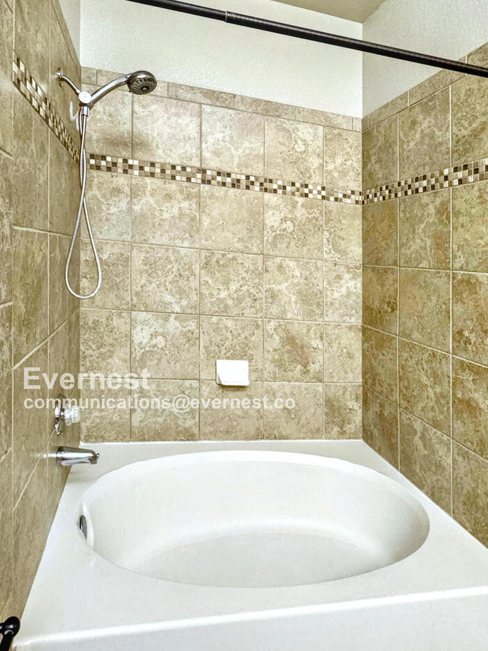 Building Photo - 7050 E Sunrise Dr