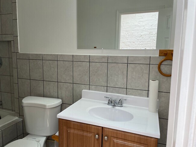 Building Photo - Charming 2-Bedroom, 1.5-Bathroom Brick Townhouse in Pigtown