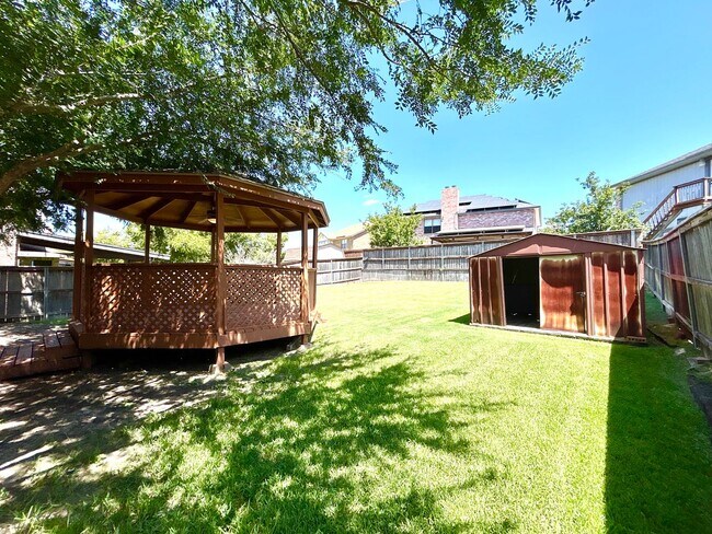 Building Photo - *COMING SOON* Energy-Efficient 4BR Home w/ Solar Panels, Loft & Backyard Oasis!