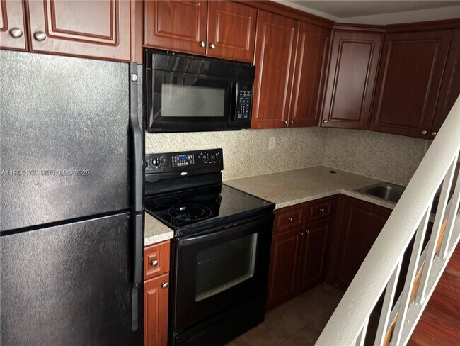 Building Photo - 8009 W 6th Ave