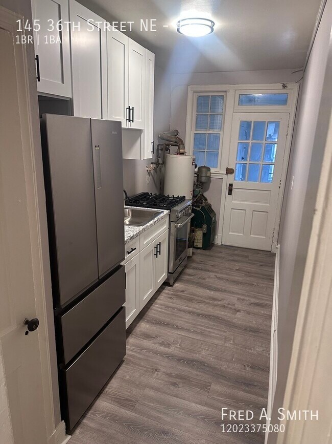 Building Photo - 145 36th St NE