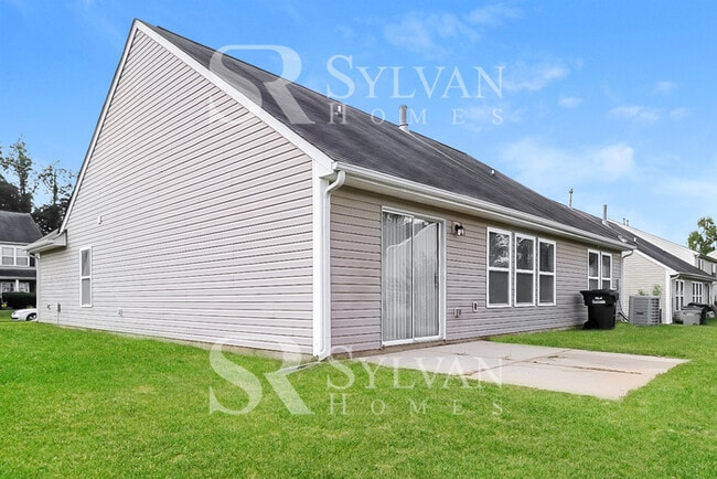 Building Photo - This adorable home is ready for your personal touch!