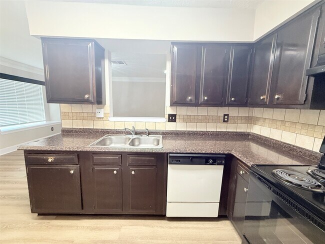 Building Photo - 6387 S Briar Bayou Dr