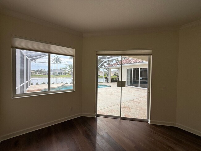 Building Photo - Luxurious 4 Bedroom 3 Bath Lakefront Pool Home W/3-Car Garage