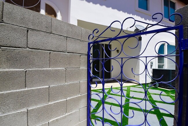 Building Photo - Charming Mediterranean-Style Townhome in G...