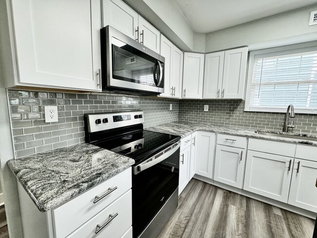 Building Photo - Updated & Ready For You On 12-05-25! A Pet-Friendly Home w/Attached Garage, All Appliances Convey...