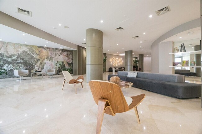 Building Photo - 10275 Collins Ave