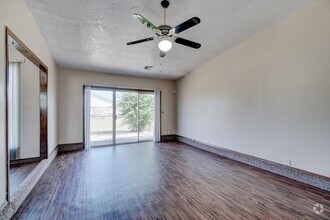 Building Photo - Spacious 2-Bedroom Duplex with Modern Upda...