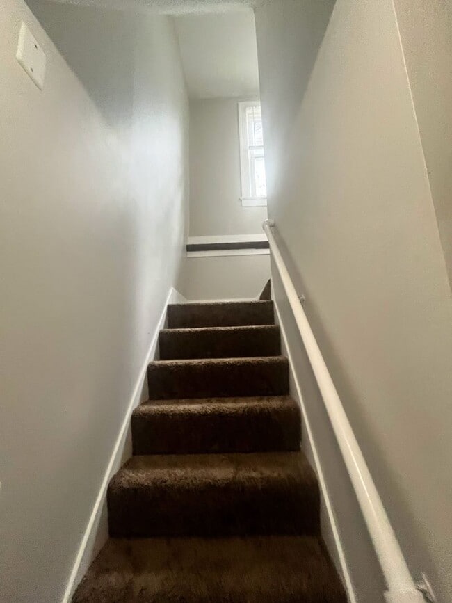 Building Photo - Three Bedroom House W/ Full unfinished Basement