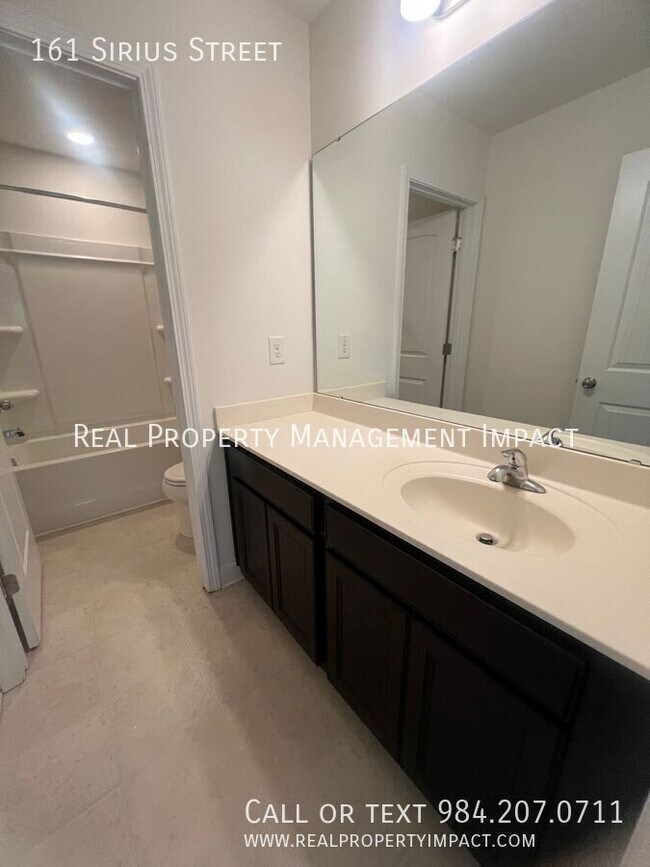 Building Photo - 161 Sirius St