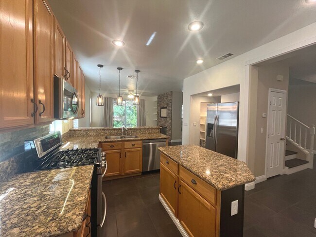 Building Photo - Discover this Gem w/sparkling pool & spa!