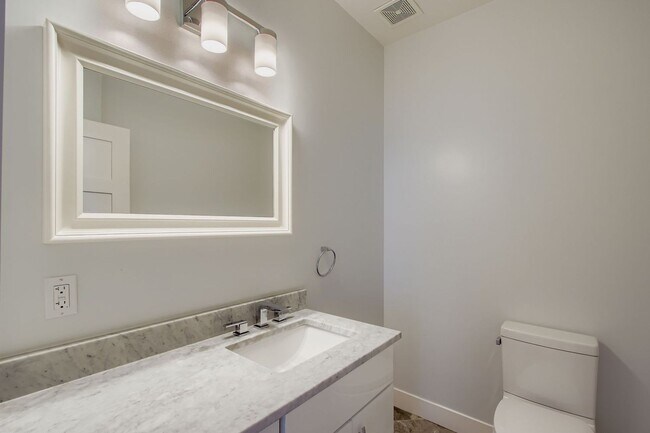 Building Photo - Edge Water Beauty- This is a Must See Home!