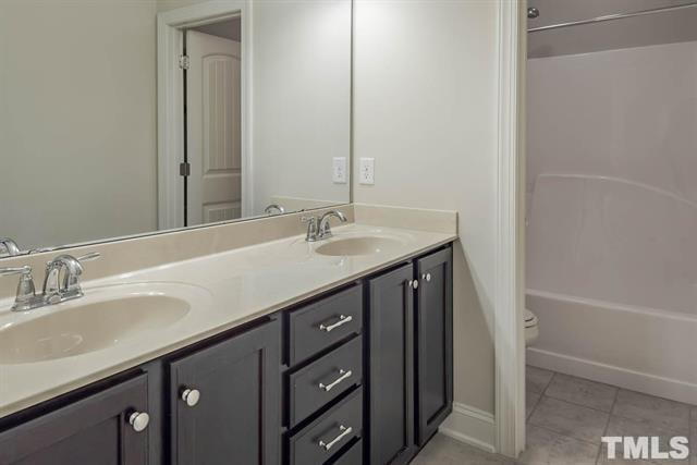 Building Photo - Beautiful 4-Bedroom Stone Front Home in Prime West Cary Location with Fenced Backyard & Resort-St...