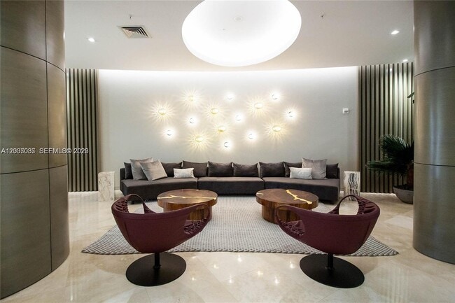 Building Photo - 10275 Collins Ave