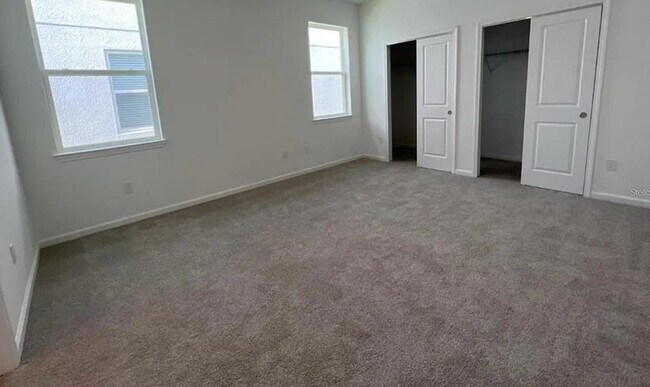 Building Photo - Spacious & Modern 4-Bed Home in Hartwood Landing – Minutes from Orlando!