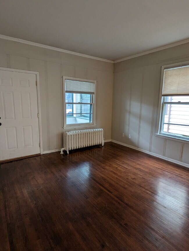 Building Photo - Bright & Charming 3BR With Garage Included In NE Minneapolis