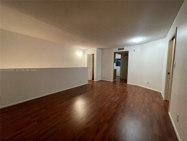 Building Photo - 303 Gardens Dr