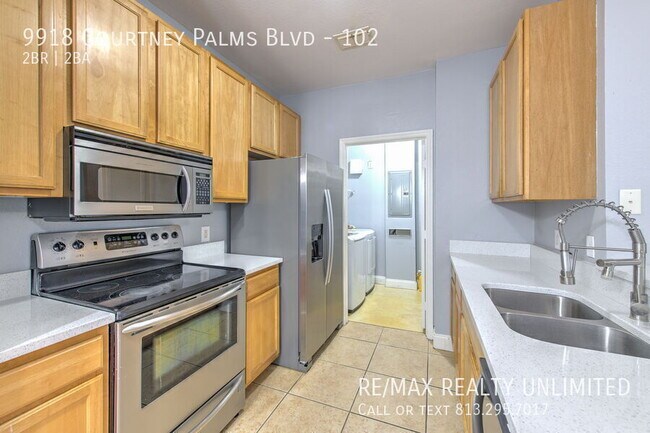 Building Photo - 9918 Courtney Palms Blvd
