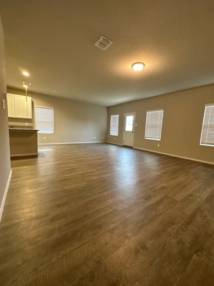 Spacious living area with wood finish - 2130 Dry Moss Pass