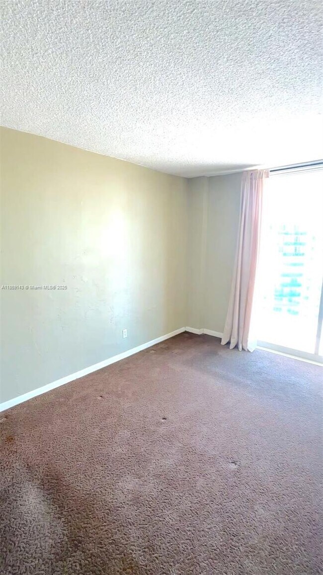 Building Photo - 19390 Collins Ave