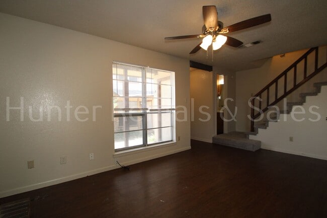 Building Photo - Charming Two-Bedroom Townhome with Fireplace