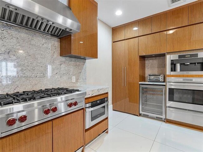 Building Photo - 9705 Collins Ave