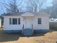 Building Photo - Cute and Cozy Rental