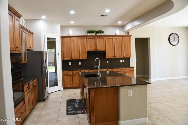 Building Photo - 9539 W Harmony Ln