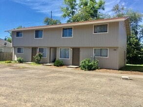 Building Photo - Update Two Bedroom on the First Floor with Covered back patio!