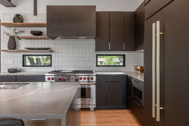 Building Photo - Modern Luxury Rental with Unobstructed Fla...