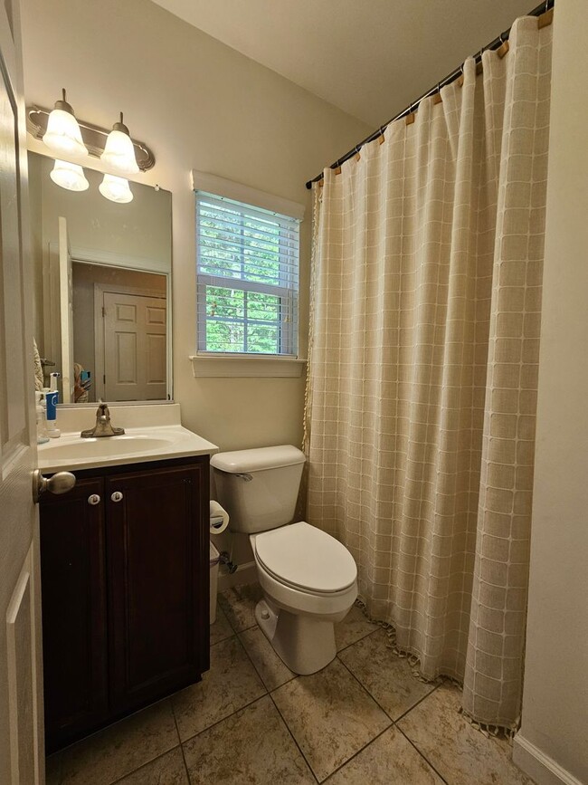 Building Photo - GRASSFIELD - Lauren's Cove