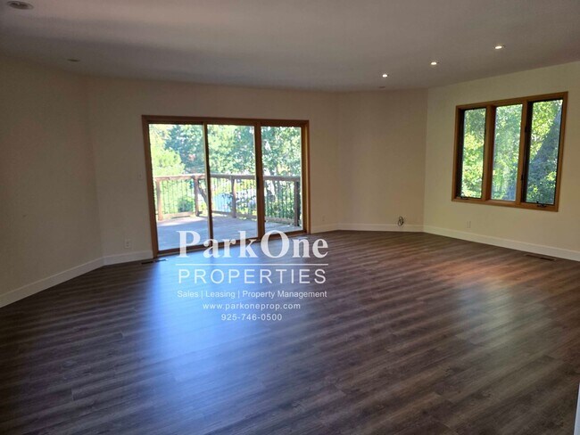 Building Photo - Spacious Home on a Private Wooded Lot Now Available!