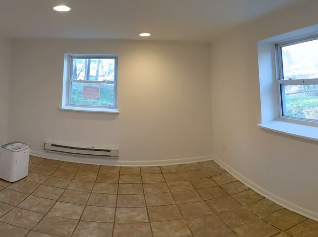 Building Photo - 2 bedroom 1 bath basement apartment with washer and dryer in Forest Hills, Cullowhee NC available...