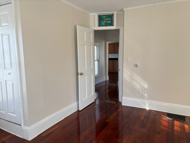 Unit 1 - bedroom view to hallway - 381 Broadway