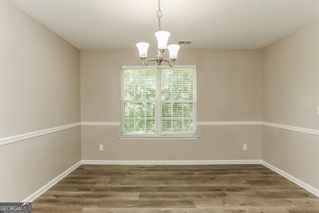 Building Photo - 3943 S River Ln