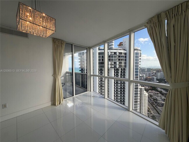 Building Photo - 18201 Collins Ave