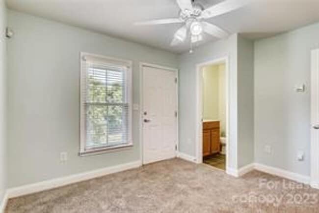 Building Photo - Wonderful craftsman style end-unit townhome