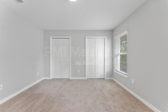 Building Photo - 9461 N Sandree Dr
