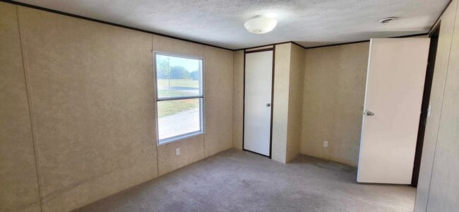 Building Photo - 2/2 single wide outside city limits