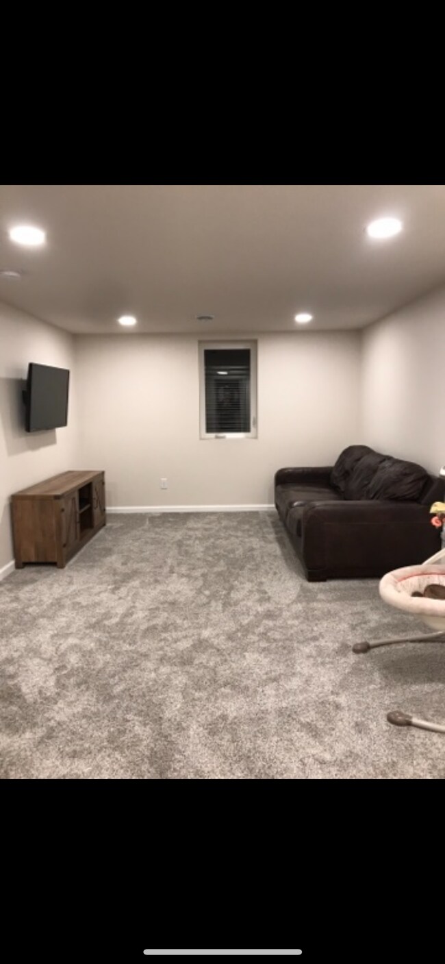 Downstairs living area - 305 1st Ave NE
