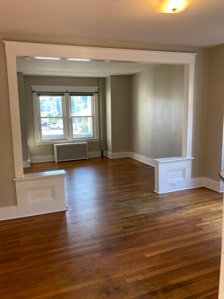 living room with no furniture - 1241 Western Ave