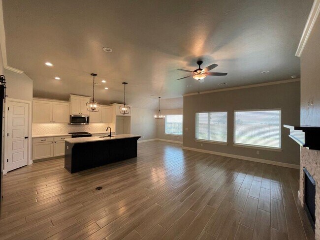 Building Photo - Deer Creek Schools! Storm Shelter, great colors, lots of light, swim, workout and play right in t...