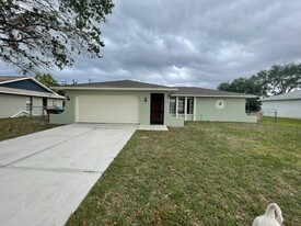 Three  bedroom, two bathrooms , two car attached garage - 247 SE Santa Barbara Pl