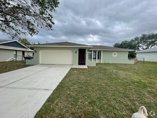 Three  bedroom, two bathrooms , two car attached garage - 247 SE Santa Barbara Pl