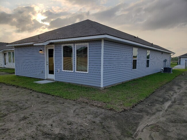 Building Photo - 5668 Magnolia de Percy Dr