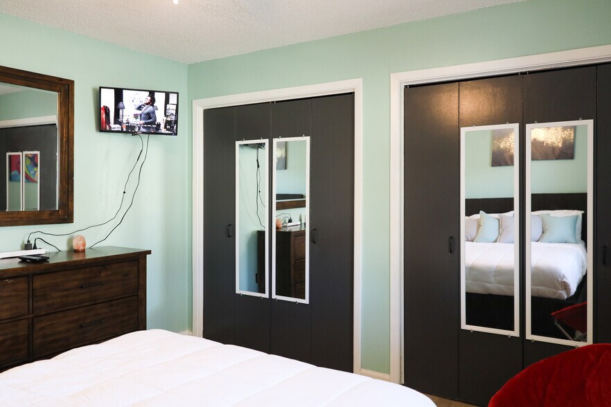 Double closet in bedroom1. Mirrors so you can check yourself out ;-) - 8612 Echo St