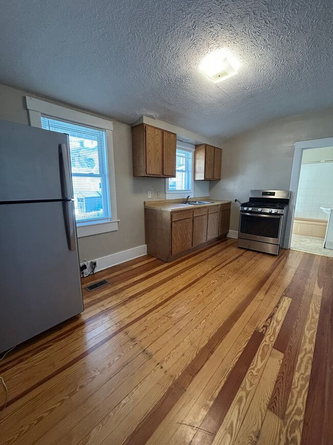 Building Photo - Charming 2-Bedroom Home Between Dundee & Blackstone with Large Attached Garage & Hardwood Floors